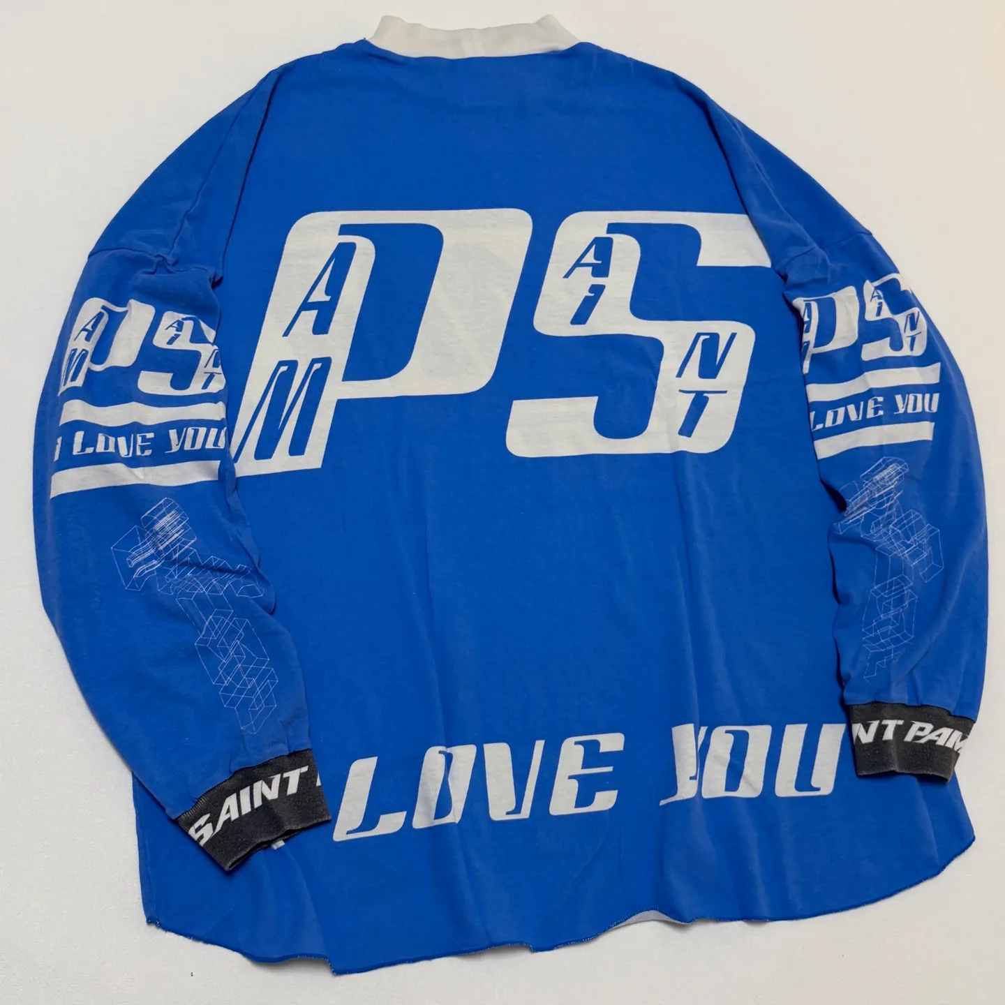 SAINT Mxxxxx Make the printing look distressed and white. Correct accessories. Customized co-branded model with P.A.M. wash mark.